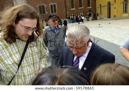 WROCLAW, POLAND - JUNE 02: Andrzej Leper (4th R) Polish former prime minister meets people before elections to the EU parliament, June 02, 2009 in Wroclaw, Poland