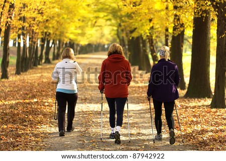 Three women in the park - Nordic walk