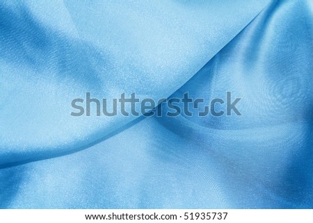 The texture of transparent light blue material.