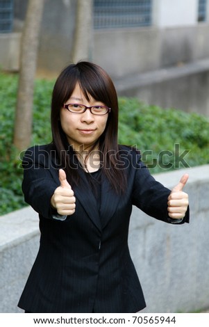 Business woman thumb up