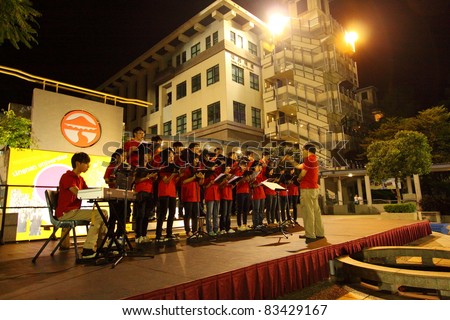 HONG KONG - 24 AUG, Lingnan University holds new student orientation every year to welcome freshmen on 24 August, 2011, Hong Kong. Christian Choir is singing to attract students to join their society.