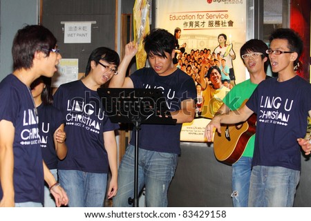 HONG KONG - 24 AUG: Lingnan University holds new student orientation every year to welcome freshmen on 24 August, 2011, Hong Kong. Christian Choir is singing to attract students to join their society.