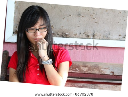 Asian girl thinking outside the classroom