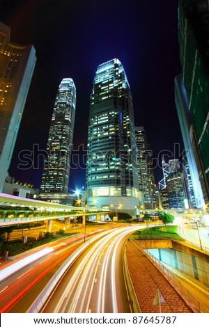 Traffic in city at night, it shows the busy business environment of Hong Kong.