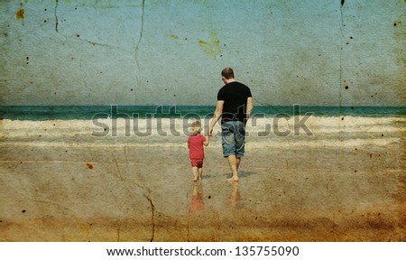 father and daughter on the beach. Photo in old image style.