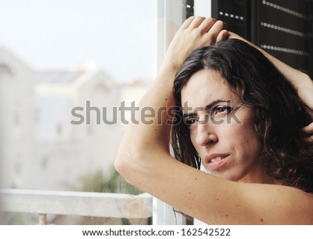 Portrait of beautiful sad 35 years old woman