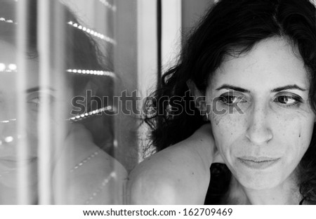 Portrait of beautiful sad 35 years old woman