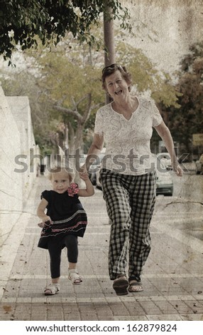 Happy Grandma With Grandchild