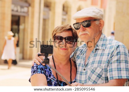 Happy loving senior couple enjoying vacation together