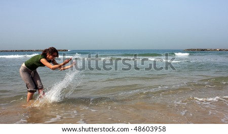 girl in sea spray. Summer, vacation