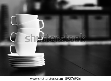 white tea or coffee cups, soft focus
