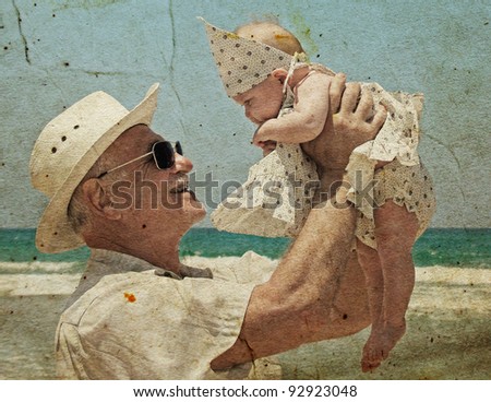 happy grandpa is holding a little granddaughter. Background - the sea.  Photo in old image style.