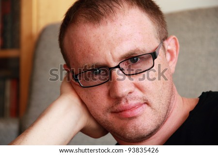 handsome young man with glasses