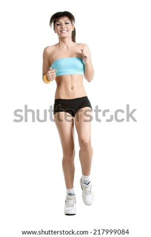 Beautiful sexy brunette girl posing in sportswear on white background