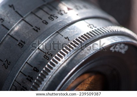Metal detail of old vintage lens closeup