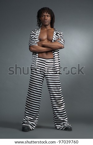 Serious men afro-american pose on gray background