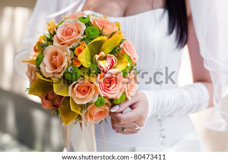 Bride with bouquet, closeup