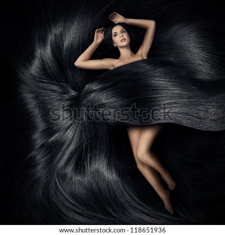 Beautiful woman lying on the hair and cover her body