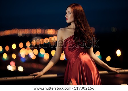 Young Beauty Famous Woman In Red Dress Outdoor