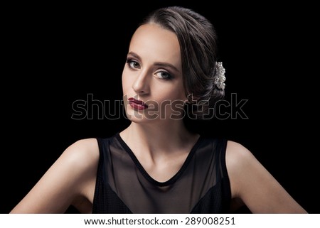 Beautiful Woman. Fashion Festive Coiffure with Pearls. Upsweep. Hairstyle.