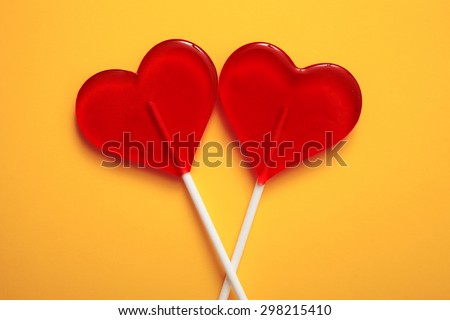 Two lollipops. Red hearts. Candy. Love concept. Valentine day.