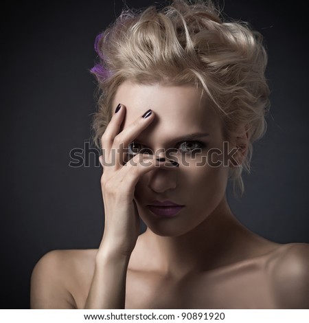 Fashion woman portrait on dark background