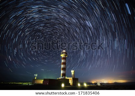 Star trail at night over Lighthouse