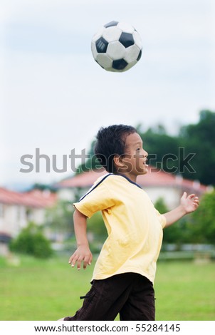 A Local boy playing football