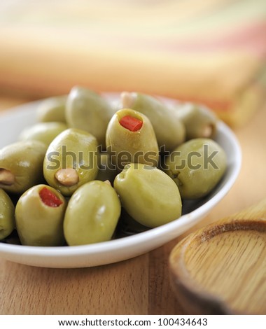 green olives stuffed with red pepper and almond