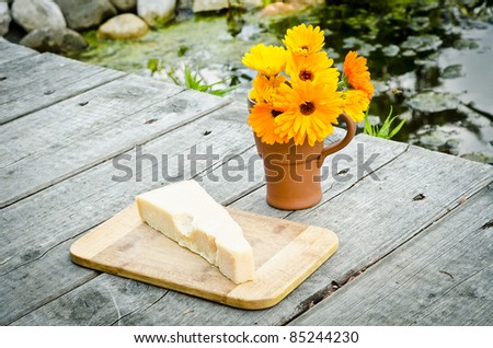 cheese and flowers at a bridge