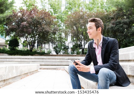 Young entrepreneur look to the future sit on a stairs