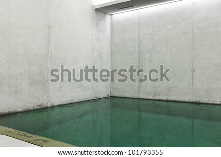 modern concrete house , indoor pool