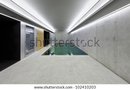 modern concrete house , indoor pool