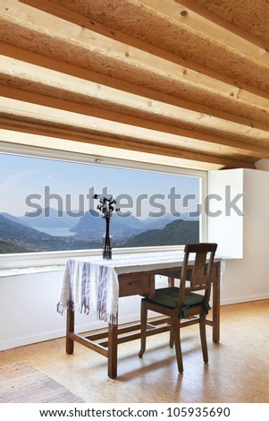 view of the room, rural home interior, picture window