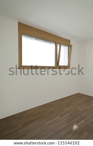 empty room with window, parquet floor