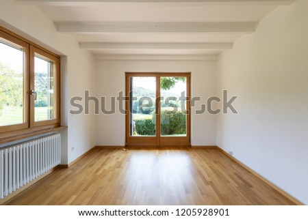 White empty room with nature view. Nobody inside