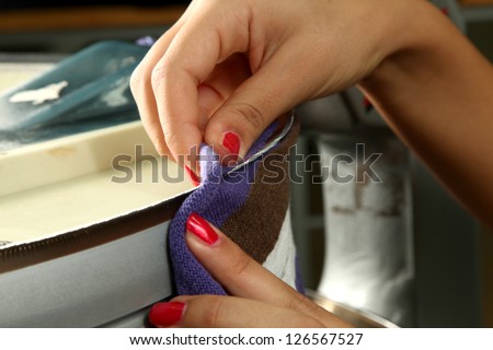 Industrial textile factory, woman at work, detail