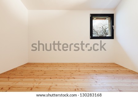 Interior of stylish modern house, room with a small window