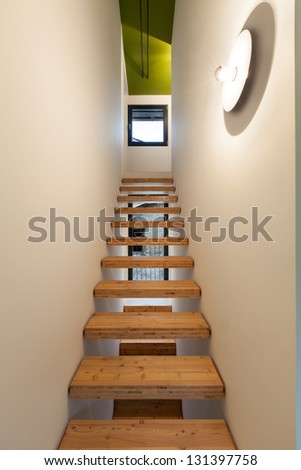 Interior of stylish modern house, view of the stairs