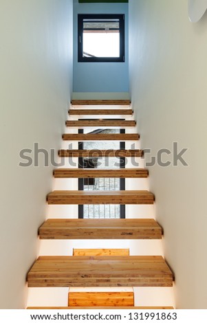 Interior of stylish modern house, view of the stairs