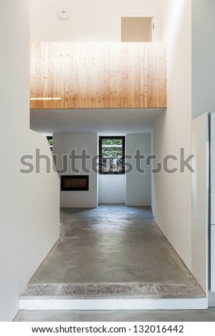 interior of stylish modern house, room view from the passage