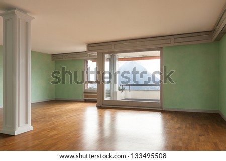 Interior, empty apartment in style classic, large room with panoramic windows