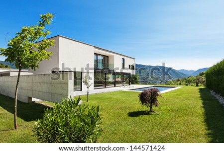 Modern villa with pool, view from the garden