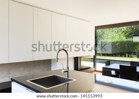 Modern villa, interior, view room from kitchen