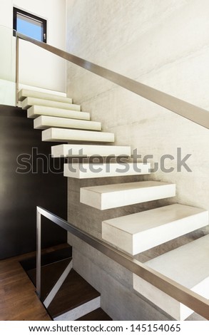 Modern villa, interior, view concrete staircase