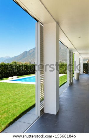 Modern villa with pool, view from the porch