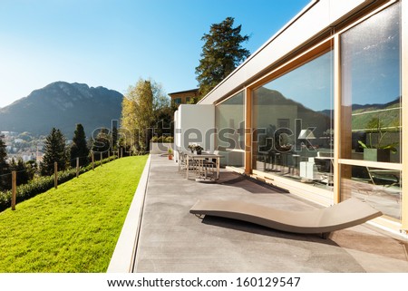 Beautifull modern house in cement, interiors, view from the corridor