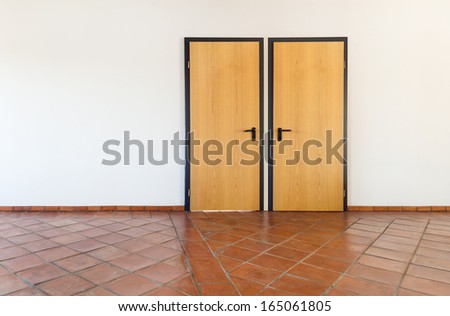 Architecture, interior, empty room with two doors, terracotta floor