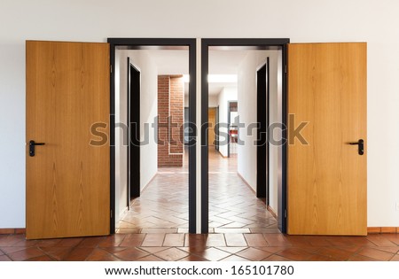 Architecture, interior, empty room with two doors, terracotta floor