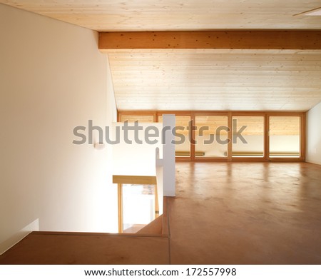 Home with wood ceiling and white wall
